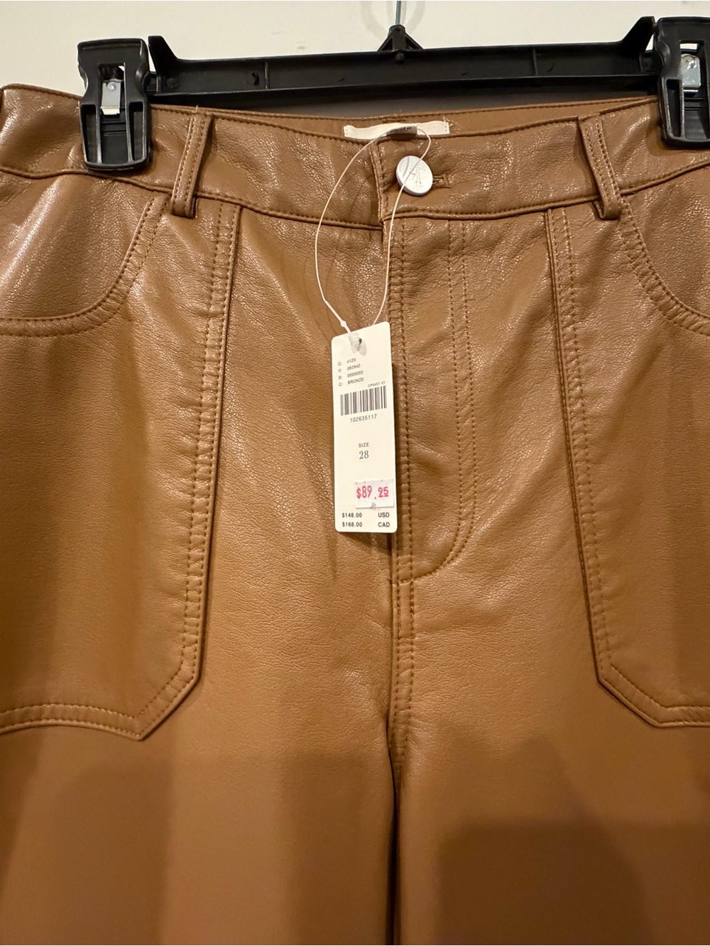 Rylan Faux Leather relaxed high-rise flare pants by Pilcro in antique bronze.